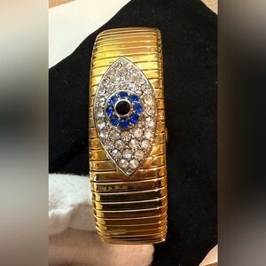 Gold tone Cuff Bracelet with Blue and Clear Eye, fun and fancy